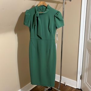 Maggy London tailored dress with tie-neck collar.